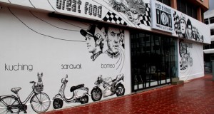 The murals on the outside walls of the cafe